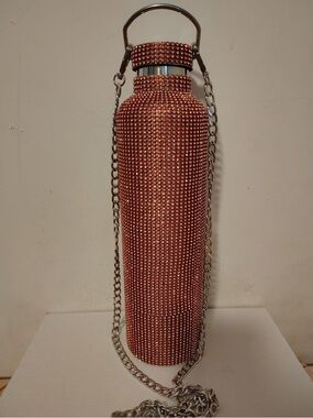 stainless steel thermos lined with sparkling pink crystals